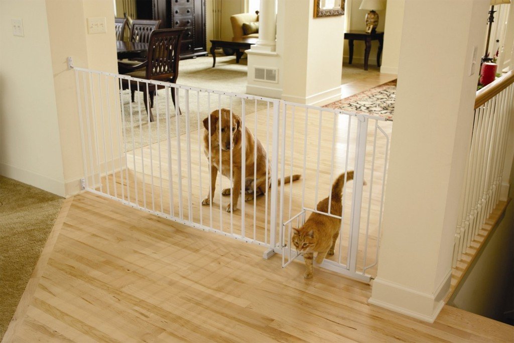 wide pet gate with cat door opening 